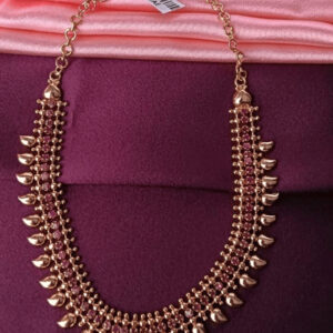 Traditional manga necklace embedded with pink gemstones